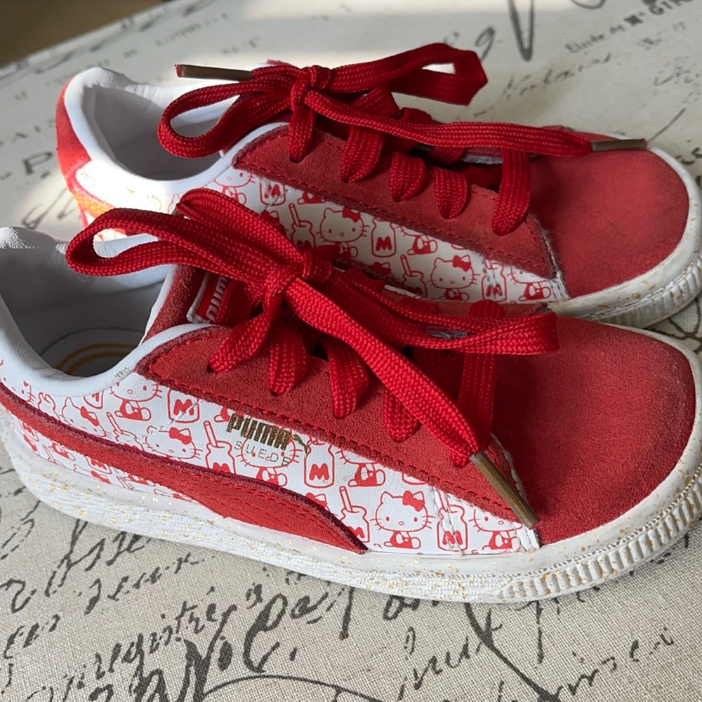 Red PUMA girl sneakers